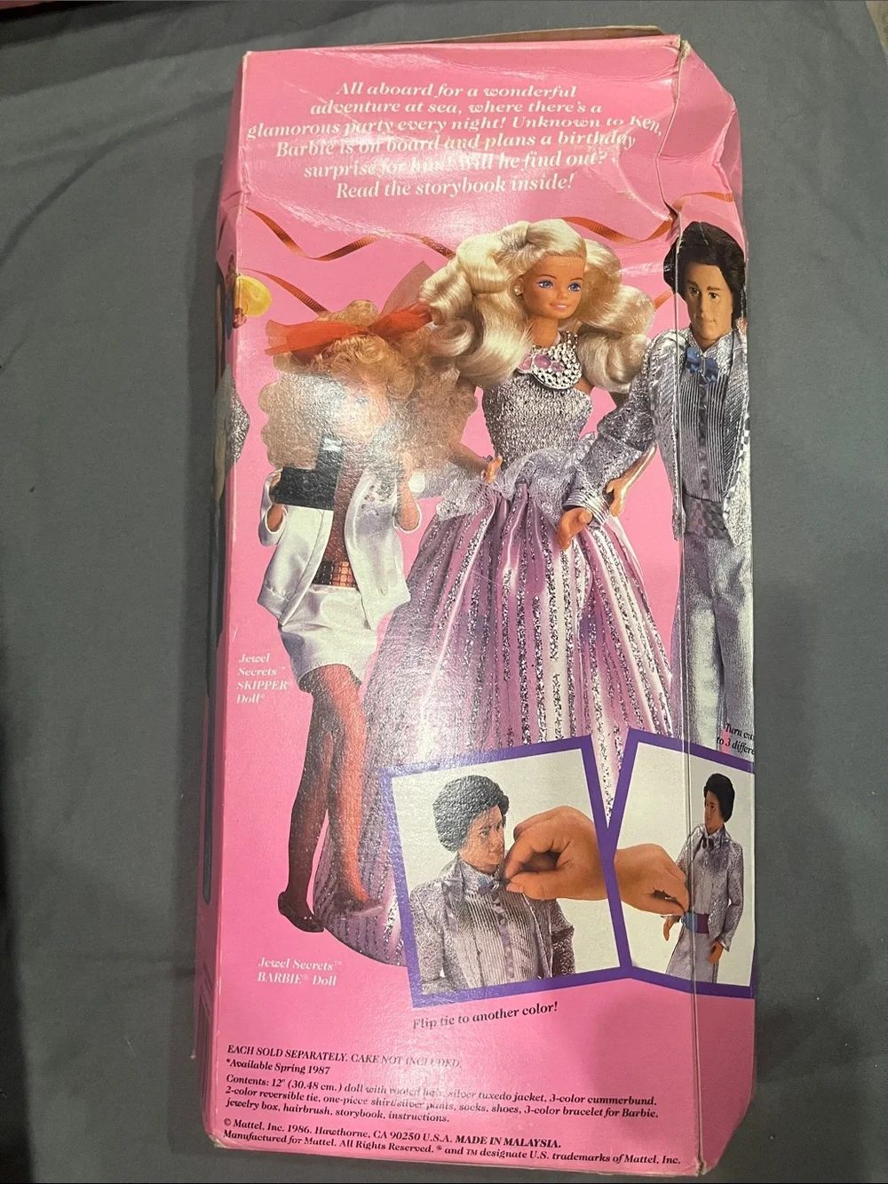 Mattel Ken in Metallic Silver Outfit with Aqua Accents